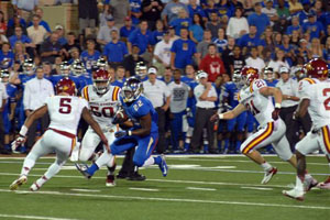 TU running back Trey Watts looks for room to run during Thursday night's game against Iowa State.