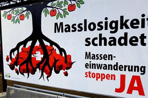  During Swiss vote on EU immigration. An electoral poster in favor of a “stop mass immigration” referendum