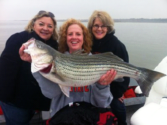 Barbara Pope caught this 24.7 pound striped bass from Lake Texoma.