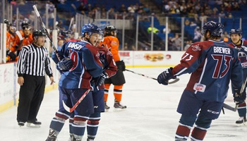 Brady Ramsay (19) celebrates with his teammates after his early goal on Friday night. Photo: Kevin Pyle