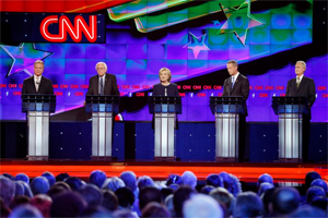 Democratic presidential candidates from left, former Virginia Sen. Jim Webb, Sen. Bernie Sanders, of Vermont, Hillary Rodham Clinton, former Maryland Gov. Martin O'Malley, and former Rhode Island Gov. Lincoln Chafee take the stage before the CNN Democratic presidential debate Tuesday, Oct. 13, 2015, in Las Vegas. (AP Photo/John Locher) 