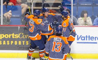 The Oilers celebrate a goal in Sunday game with Missouri.