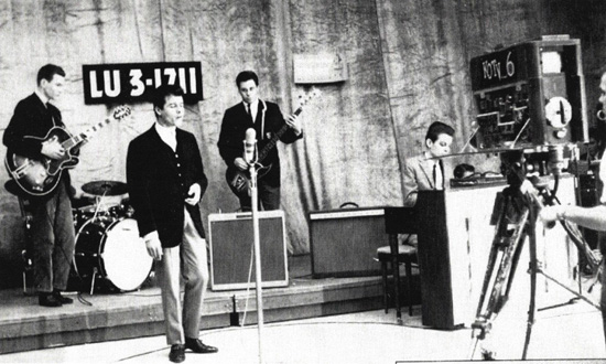 This KOTV photo is from the 1958 March of Dimes Telethon, Left to right, Tommy Crook, drummer Chuck Blackwell, Jimmy 'Junior' Markham, Bill Raffensperger and (Leon) Russell Bridges ("It was like 2 AM after our nightclub gig." - Jr)